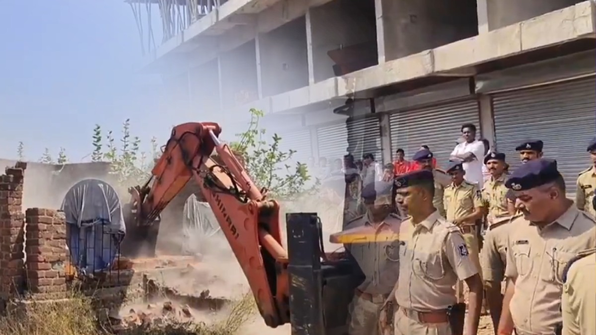 bulldozer action on illegal constructions in mahisagar gujarat beautification of vasia talab begins