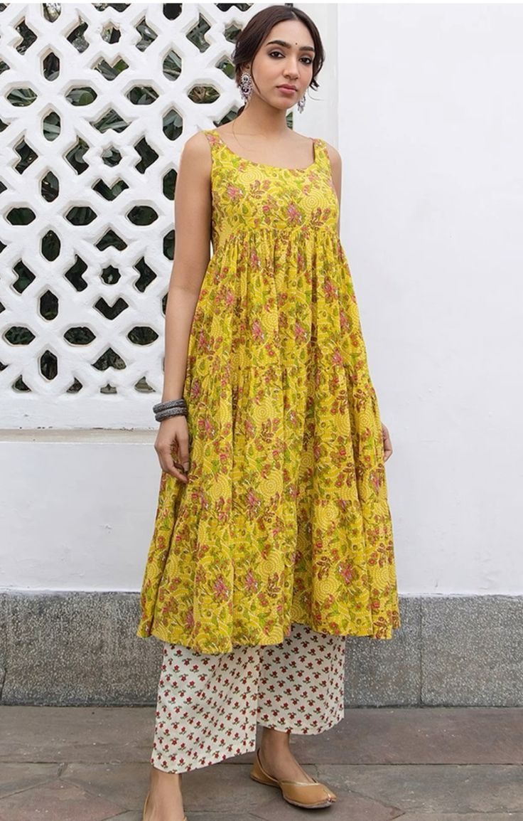 આ સ્લીવલેસ ડિઝાઇનની કુર્તી પહેરવાથી તમે સ્ટાઇલિશ દેખાશો, સેવ કરો ફોટો 8 10 different sleeveless kurti design pattern short and long to look stylish in summer7